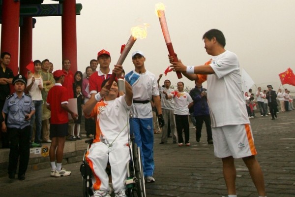 The kiss Between Beijing 2008 Paralympic Torches